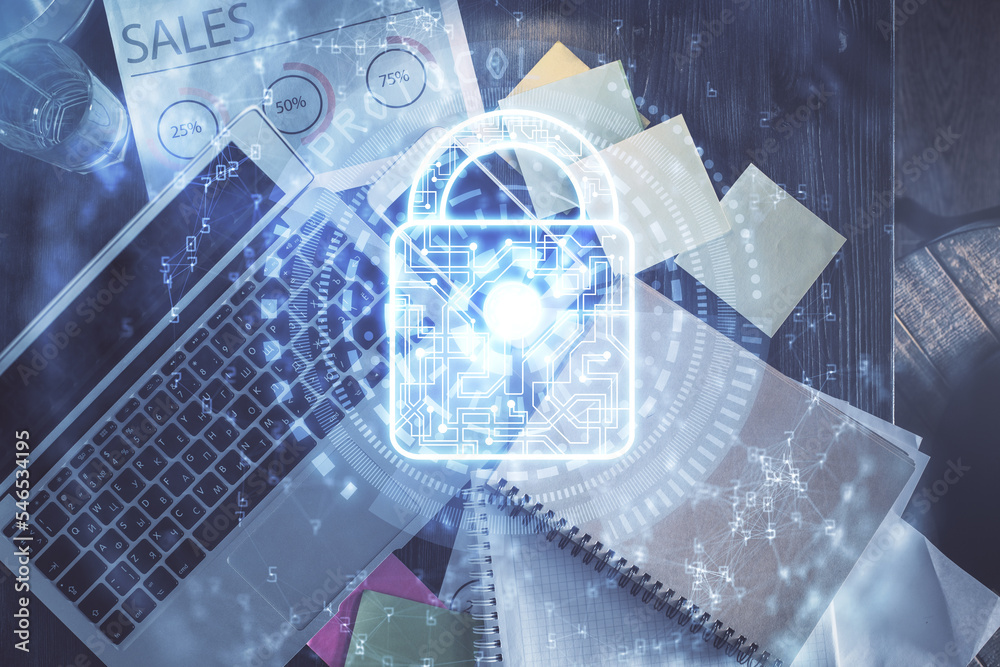 Poster Double exposure of lock hologram drawing over study table background with computer. Concept of data security. Top view.