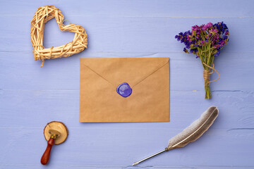 Letter envelope on lavender wooden background, copy space