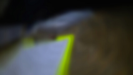 Abstract blurred background with the main composition of black, white and brown, there is also a little yellow.