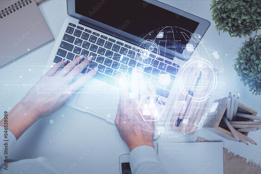 Poster double exposure of woman hands working on computer and social network theme hologram drawing. top vi