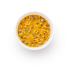 Passion fruit in white bowl isolated on white background.