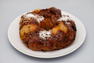 typical portuguese fruit cake Bolo rainha on plate