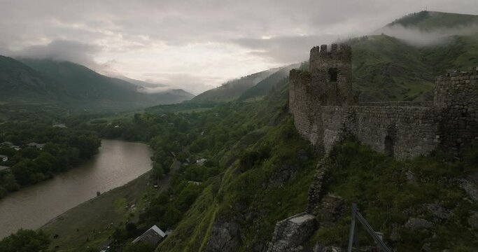 Flying Through The Medieval Stronghold Of Atskuri Fortress In Khashuri-Akhaltsikhe-Vale, Georgia. Aerial Drone Shot