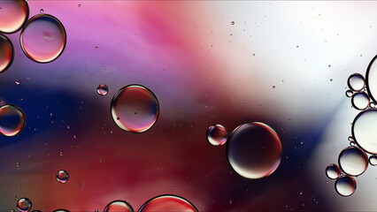 Abstract Colorful Food Oil Drops Bubbles and spheres Flowing on Water Surface