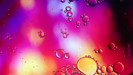 Abstract Colorful Food Oil Drops Bubbles and spheres Flowing on Water Surface