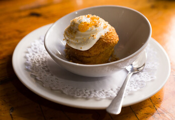 Delicious dessert - carrot cake with orange crumbs clos eup