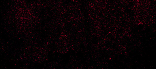 Sparks, particles and dust are sprayed off in the air. Grainy abstract texture isolated on black background. Flat design element