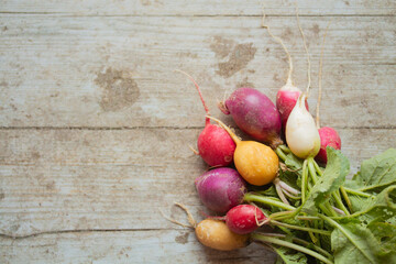 radishes on a wooden table