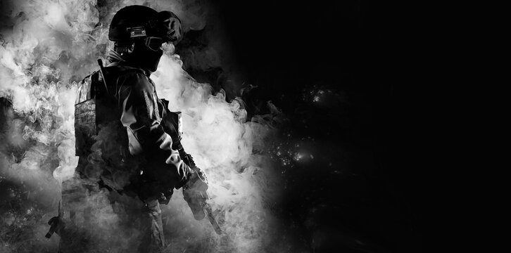 soldier fighter comes out of the smoke on the battlefield. united states military special operations. Computer games,  battlefield action, battlefield, call of duty, pubg, warefare, russia, Ukraine
