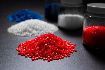 color red blue and white plastic polymer petrochemical product as polymer raw material for plastic in polymer chemical industry business design and test by engineer in polymer science laboratory