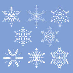 Fototapeta na wymiar Decorative snowflakes vector illustration. Snowflake shapes set.