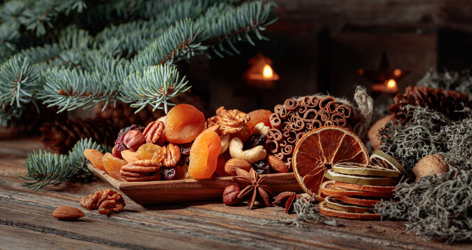 Christmas still-life with dried fruits and nuts.