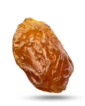 Macro close up shot of a rasin isolated on white backround