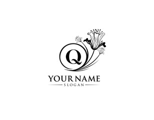 Abstract letter Q with flower logo design, logo Q vector, handwritten logo of signature, wedding, fashion shop, cosmetics shop, beauty shop, boutique, floral creative logo design.