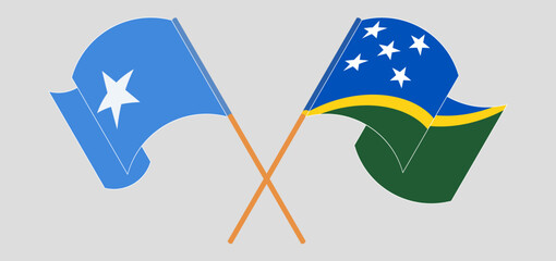 Crossed and waving flags of Somalia and Solomon Islands