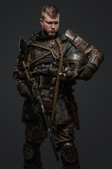 Studio shot of handsome military man in spirit of post apocalypse. © Fxquadro