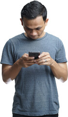 Young smiling handsome Asian man in casual attire using mobile phone isolated studio background