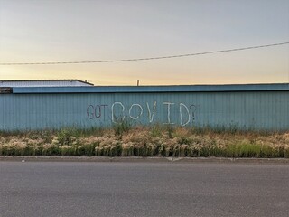 Got COVID graffiti on the side of the road