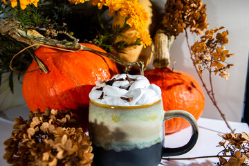 tea coffee with milk foam autumn scenery flowers pumpkins croissants - obrazy, fototapety, plakaty