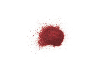 Dry beet powder scattered on white surface. Food additive E162. Heap Beetroot powder. Pigment beet red used in culinary