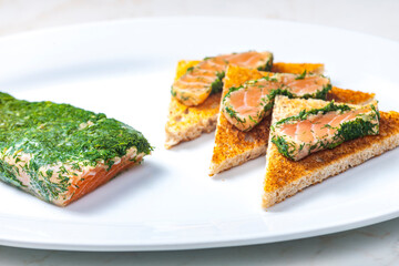 marinated salmon in dill on toast bread