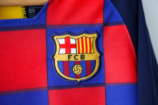 Soccer uniform of the Barcelona Club. Lionel Messi shirt. T-shirt and short. Messi's Barcelona shirt. Number 10. Logo. Argentine. Shield. Soccer player. Barca. Spain. FCB.