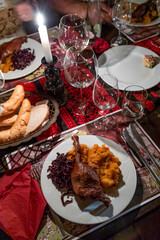 roasted poultry leg with red cabbage and puree