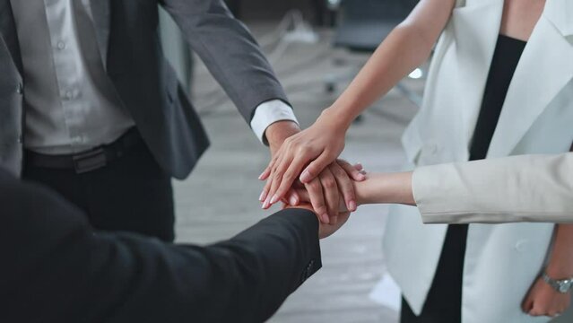 Group of business people join hands, business team collaboration concept
