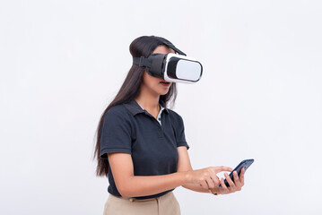 A young woman explores a VR environment via a virtual reality headset paired with her cellphone. Isolated on a white backdrop.