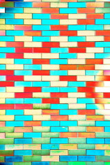 Smooth brick, smooth colored brickwork. Changed color scheme. Colorful background.