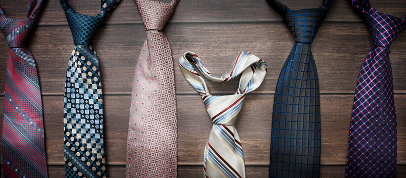 Men's necktie on Brown wooden background. Boss day, valentine's day