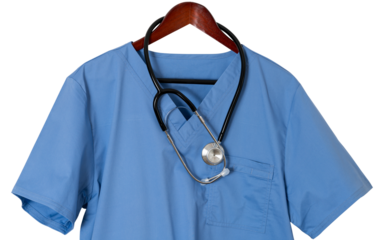 Blue scrubs shirt for medical professional hanging isolated