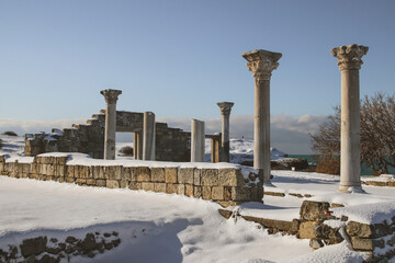 Ancient Greek columns in the snow
