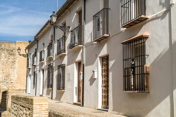 The historic center of the old town of Antequera. Historic brick church. small white buildings and narrow streets. horizontal, daylight