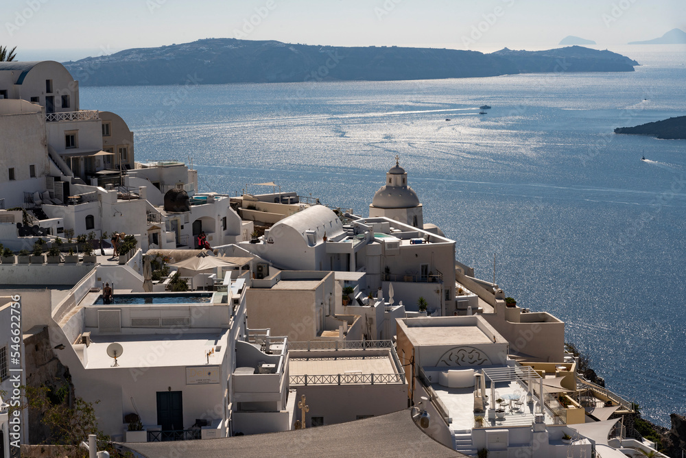 Wall mural Fira, Santorini, Greece, EU. 2022. An overview of Fira the capital of Santorini a Greek island and Aegean sea.