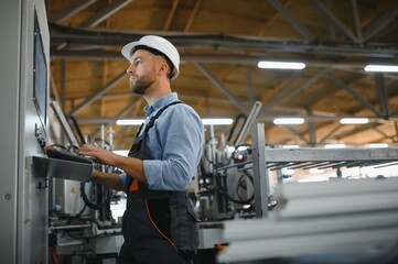 Factory worker. Man working on the production line.