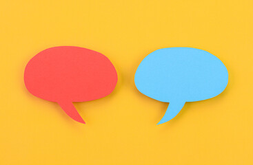 Speech bubbles arranged on a yellow background