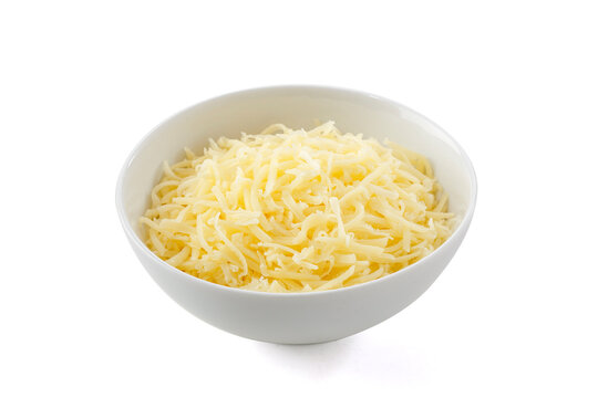 Grated Parmesan Cheese In White Bowl On White Background..