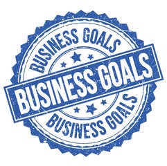 Obraz premium BUSINESS GOALS text on blue round stamp sign