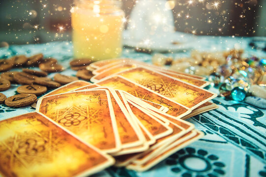 Tarot cards on the table. Selective focus.