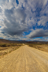 Country road leading to the mountains