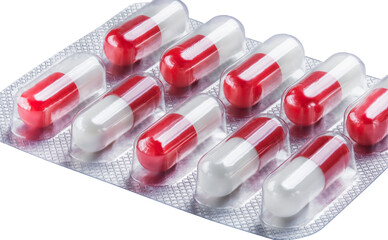 Red pills in plastic packaging. The concept of healthcare and medicine.