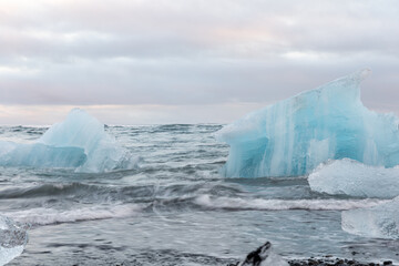 Icebergs floating into the ocean