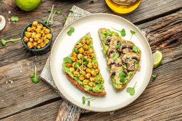 vegetarian sandwiches with avocado guacamole, chickpeas and mushrooms,