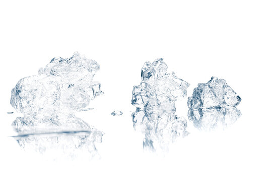 Natural crystal clear crushed ice, melting ice cubes on the white reflective surface background.