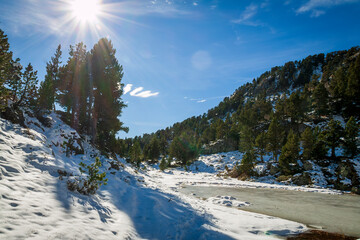 Chamrousse France 06 11 2022 winter hike around Lac Achard, pretty mountain lake located at 1917...