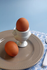 Soft boiled eggs for a light breakfast, with space for text.