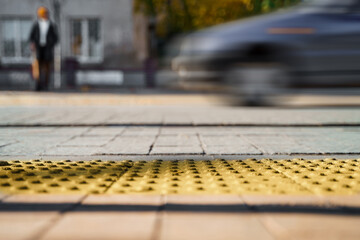 Tactile tiles for self-orientation while moving through the streets of the city