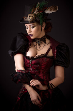 Emotional Portrait of Young Woman in Steampunk or Retro style.