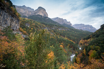 Spectacular view of the Ordesa Valley with the colors of autumn. Ordesa and Monte Perdido National...
